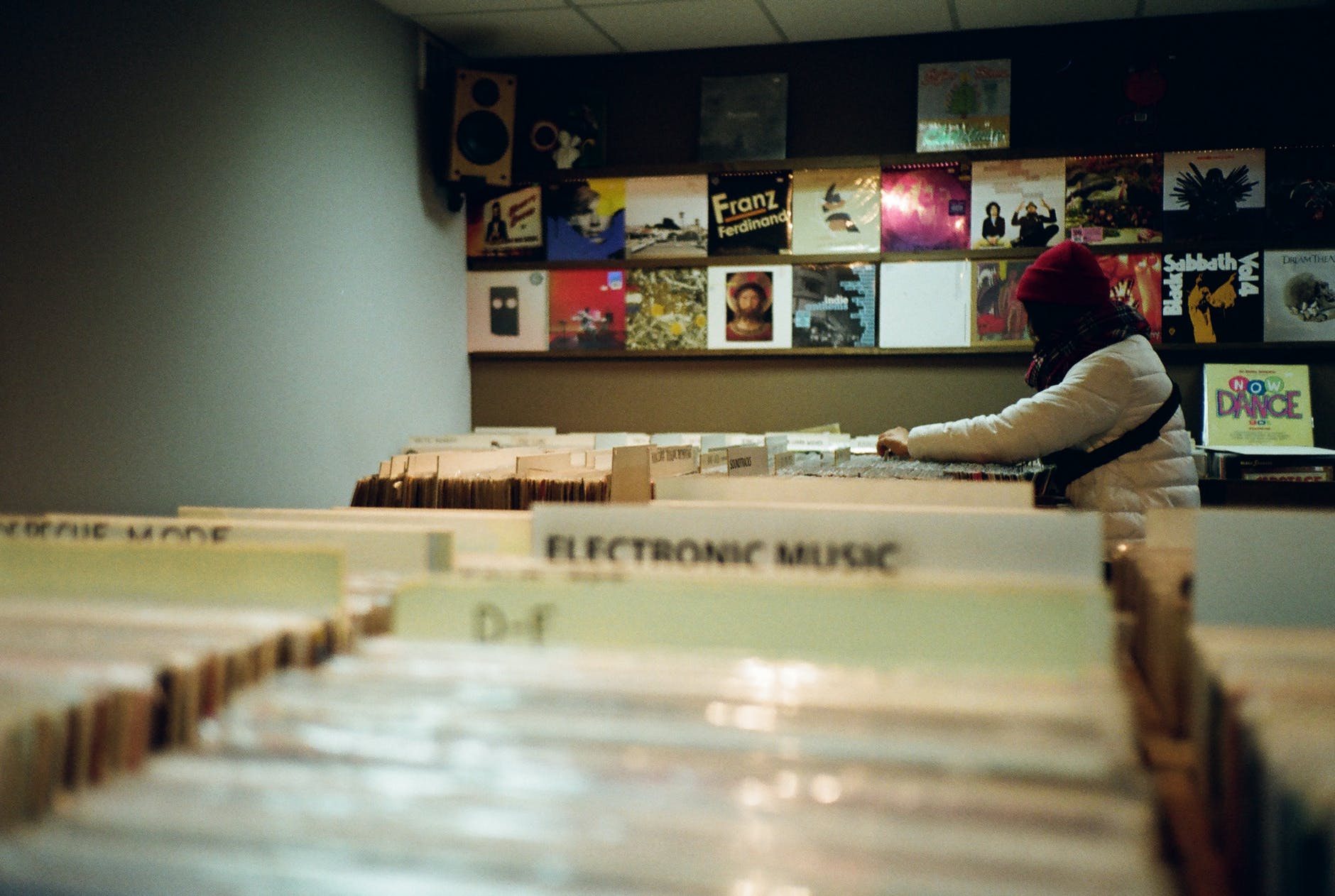woman standing leaning on desk